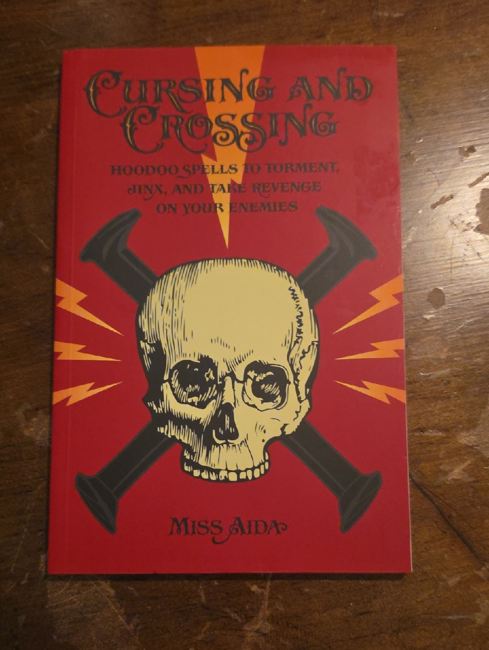 Cursing and Crossing by Miss Aida - Red & Yellow Skull Spellbook